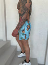Men’s Swimshorts Pineapple Skulls – Light Blue